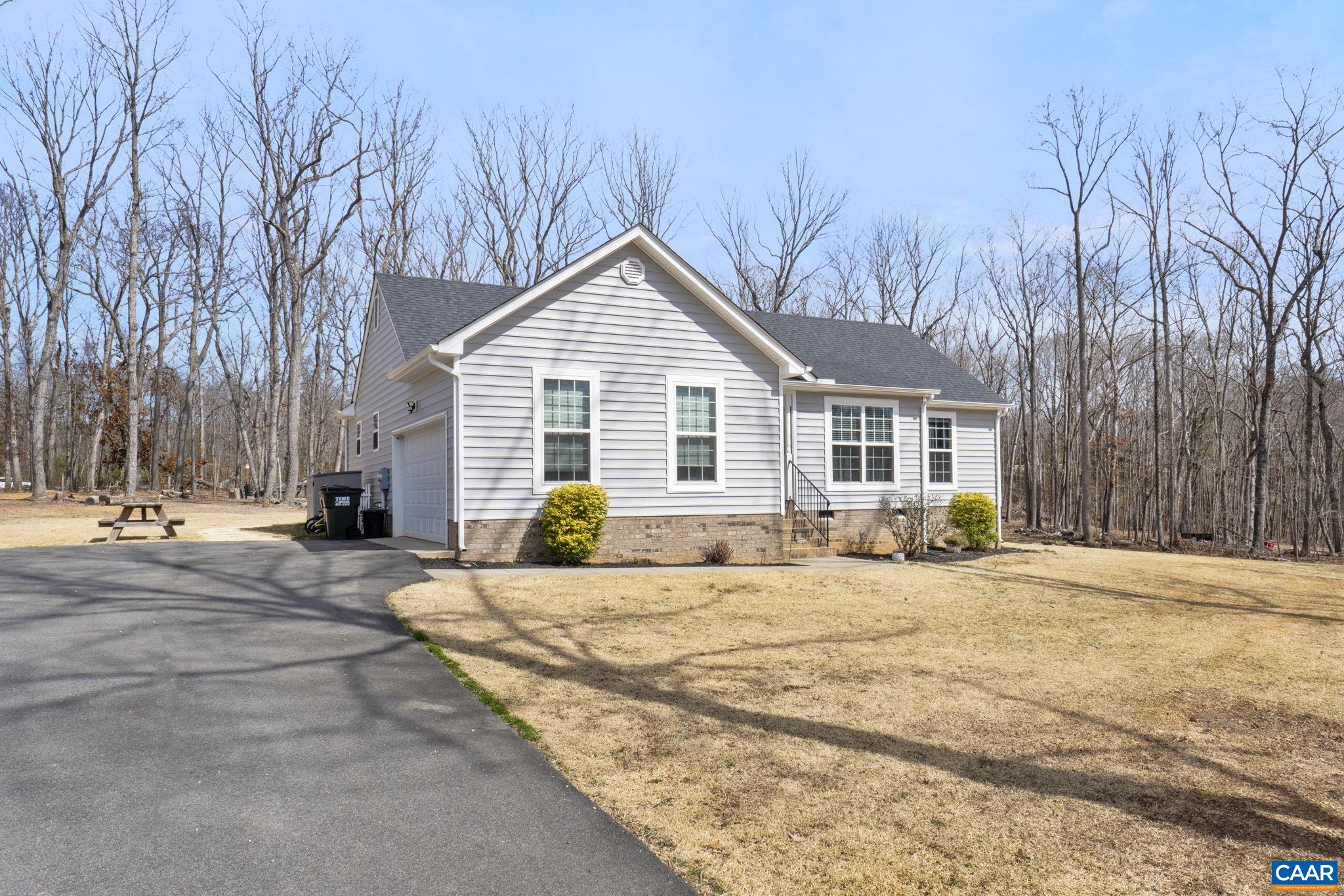 1075 Pine Crest Drive Troy, VA 22974 - Photo 3 of 25 a view of a house with a patio