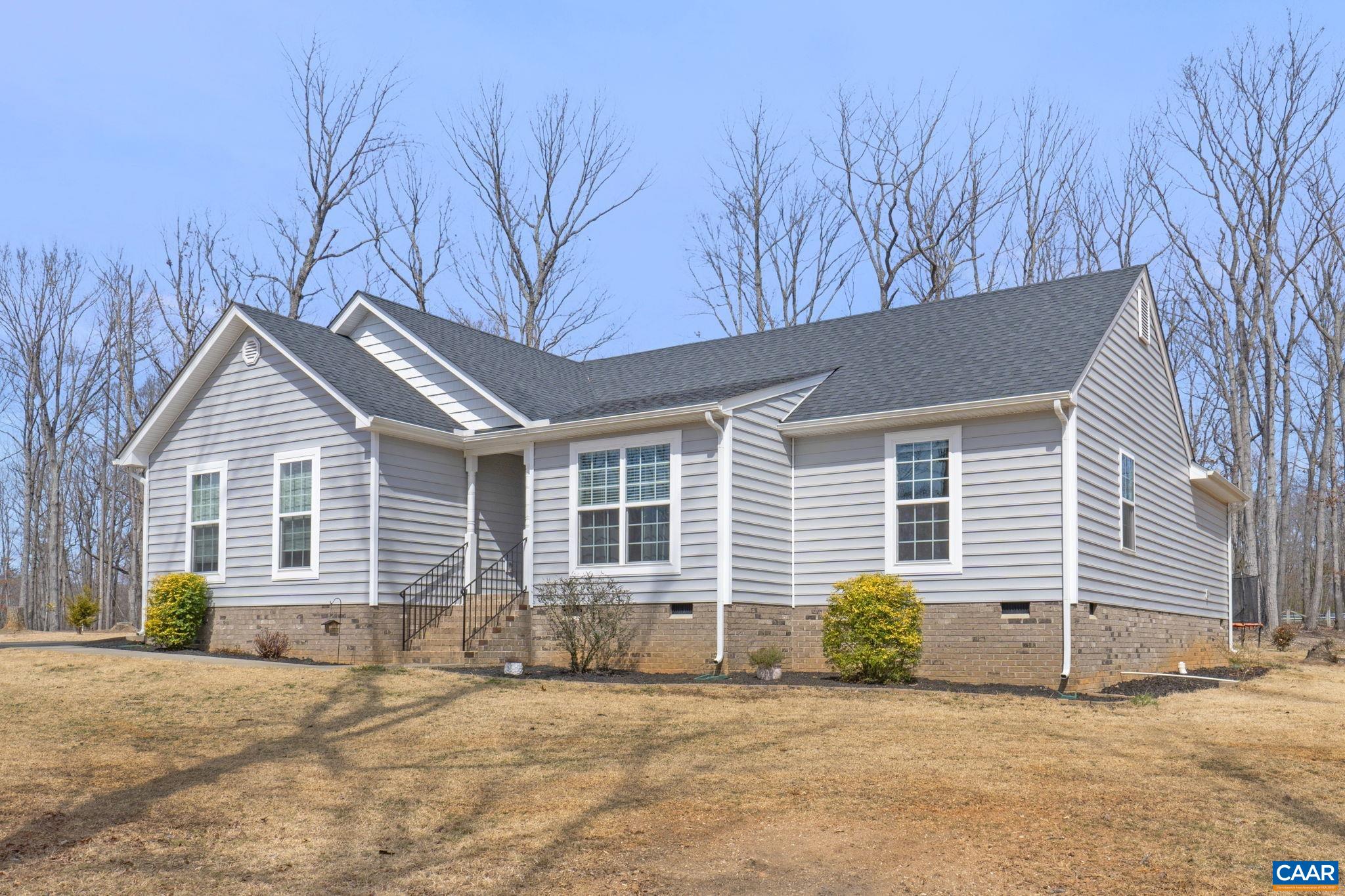 1075 Pine Crest Drive Troy, VA 22974 - Photo 4 of 25 a front view of a house with a outdoor space