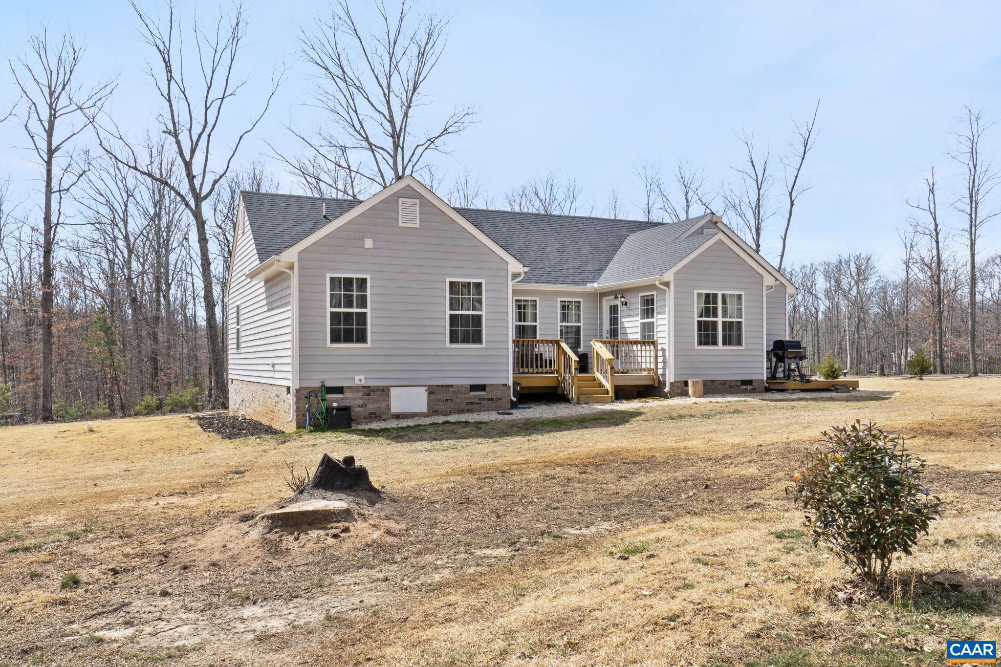 1075 Pine Crest Drive Troy, VA 22974 - Photo 5 of 25 a view of a house with a yard covered in snow