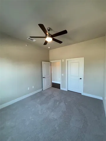a spacious bathroom with a double vanity sink a mirror and a bathtub