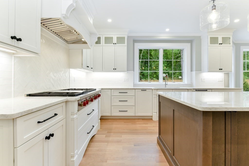 Lot 25 Leewood Road Wellesley, MA 02482 - Photo 21 of 40 a kitchen with granite countertop a sink stove and cabinets