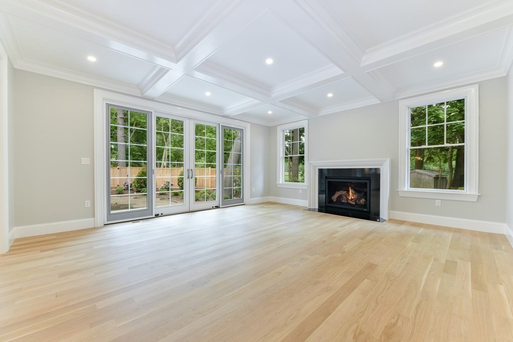 Lot 25 Leewood Road Wellesley, MA 02482 - Photo 24 of 40 a view of an empty room with a fireplace and a window