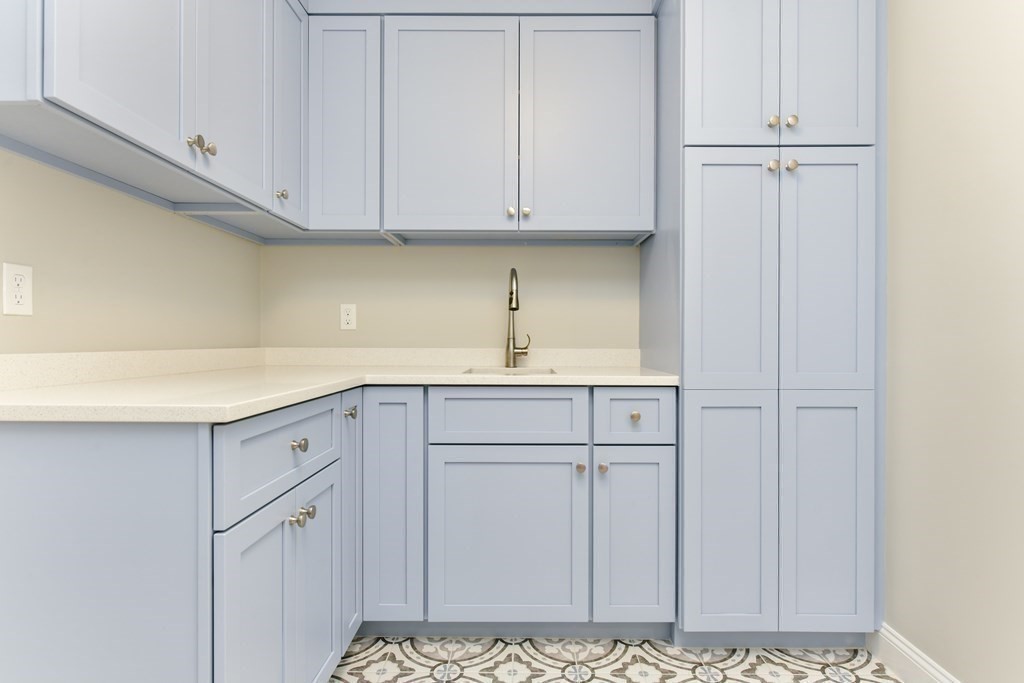 Lot 25 Leewood Road Wellesley, MA 02482 - Photo 26 of 40 a kitchen with white cabinets