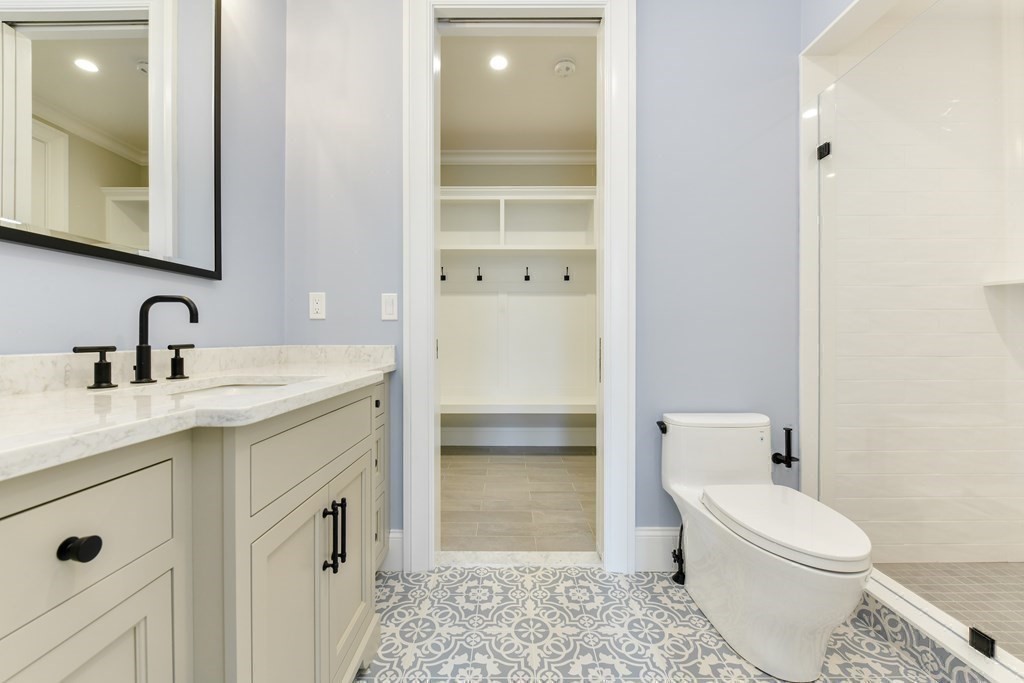 Lot 25 Leewood Road Wellesley, MA 02482 - Photo 27 of 40 a bathroom with a sink a toilet and shower