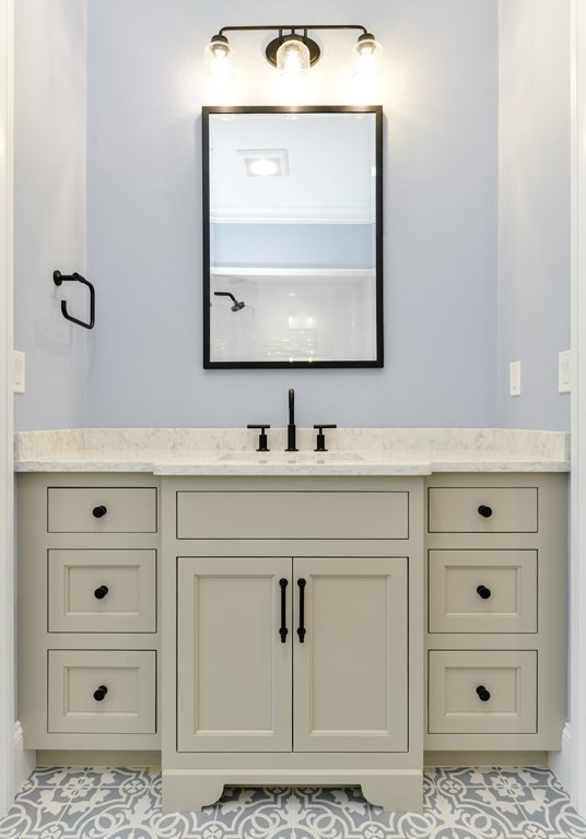 Lot 25 Leewood Road Wellesley, MA 02482 - Photo 28 of 40 a bathroom with a sink vanity and mirror