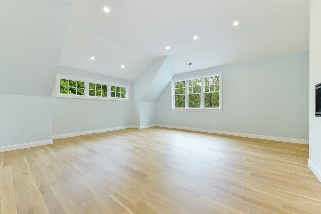 Lot 25 Leewood Road Wellesley, MA 02482 - Photo 34 of 40 an empty room with wooden floor and windows