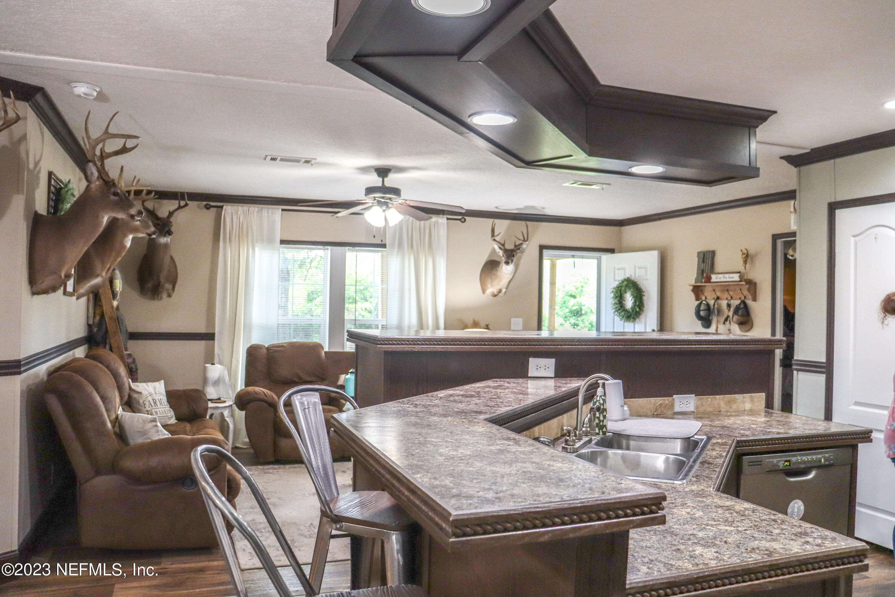 447689 Us Highway Callahan, FL 32011 - Photo 11 of 37 a view of a dining room with furniture