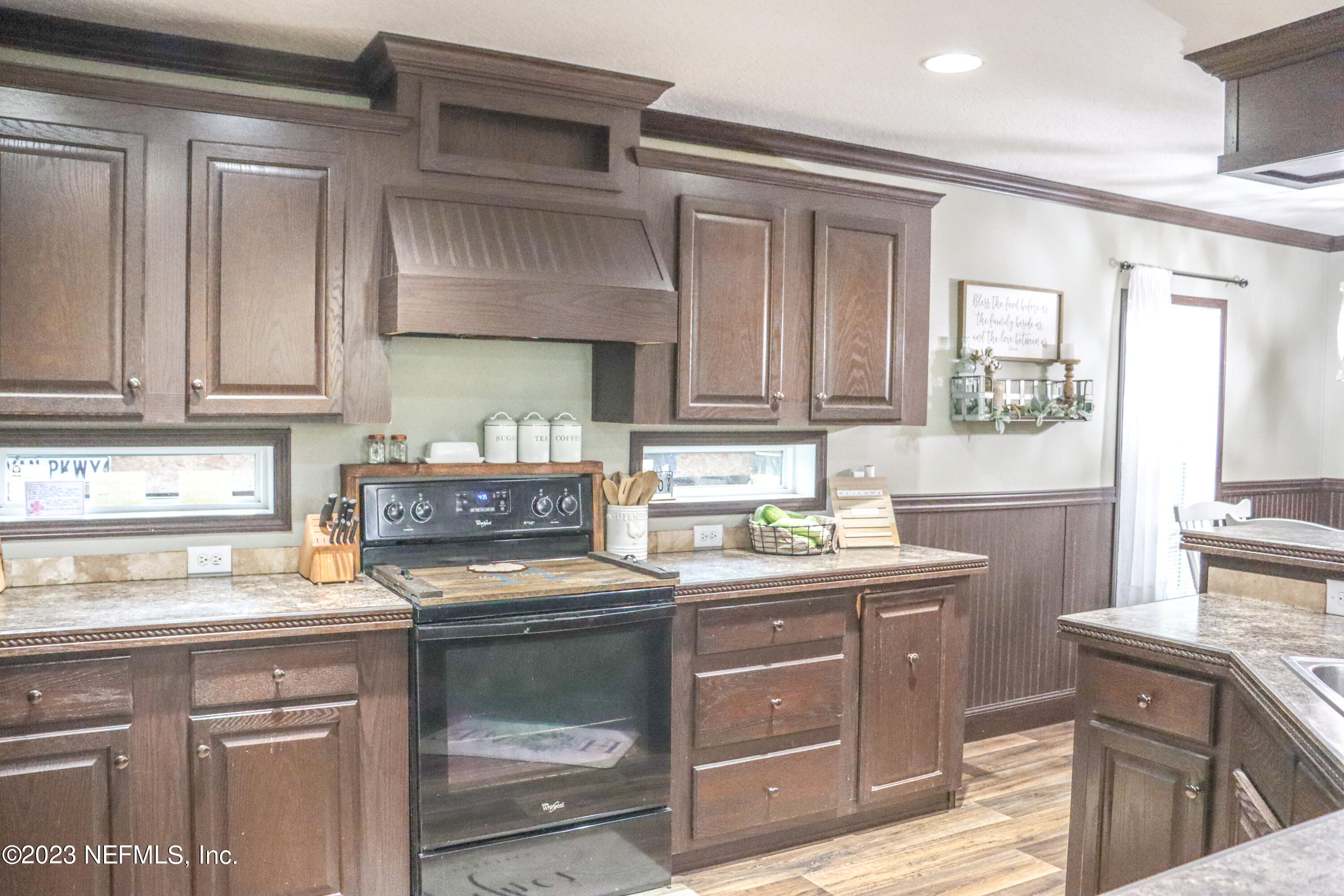 447689 Us Highway Callahan, FL 32011 - Photo 12 of 37 a kitchen with a stove and a sink