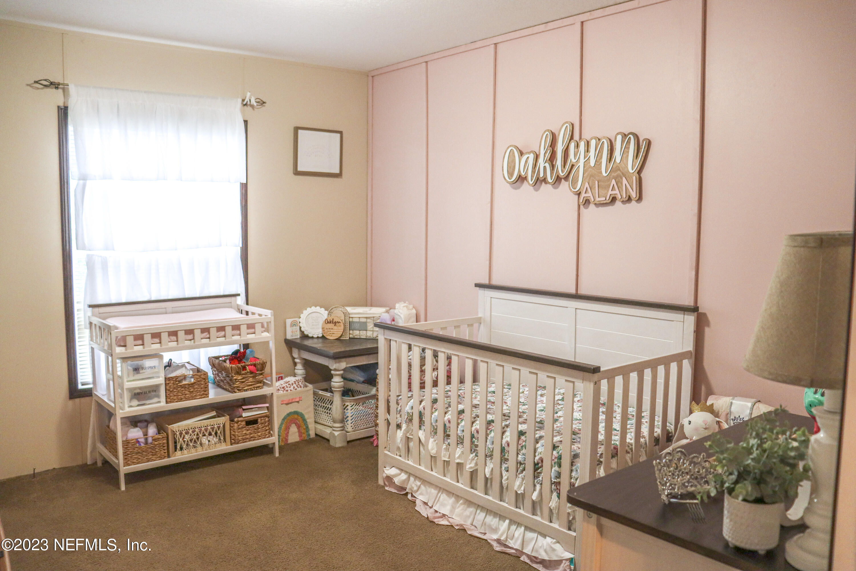 447689 Us Highway Callahan, FL 32011 - Photo 13 of 37 a bedroom with furniture and a window