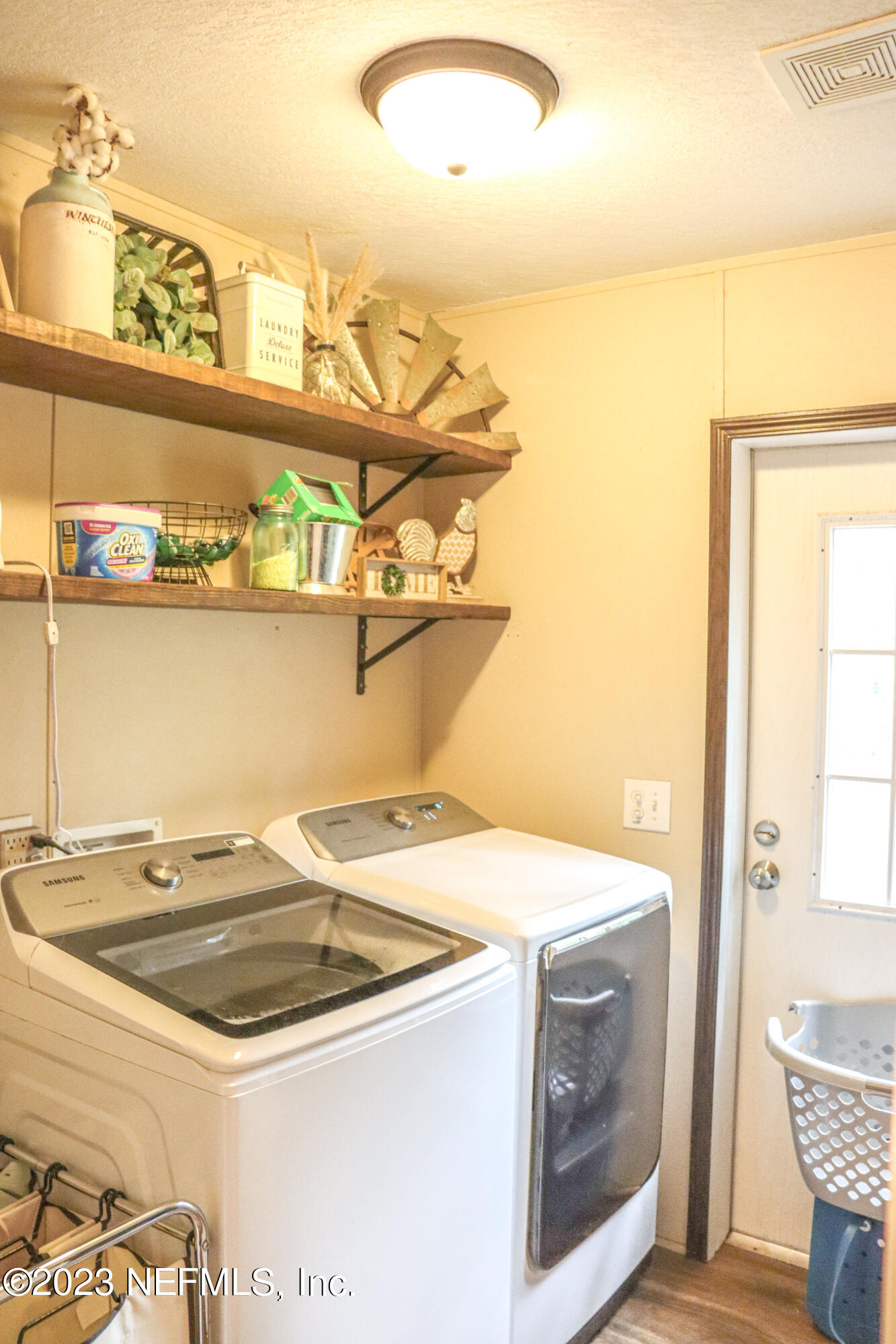 447689 Us Highway Callahan, FL 32011 - Photo 23 of 37 a utility room with dryer and washer