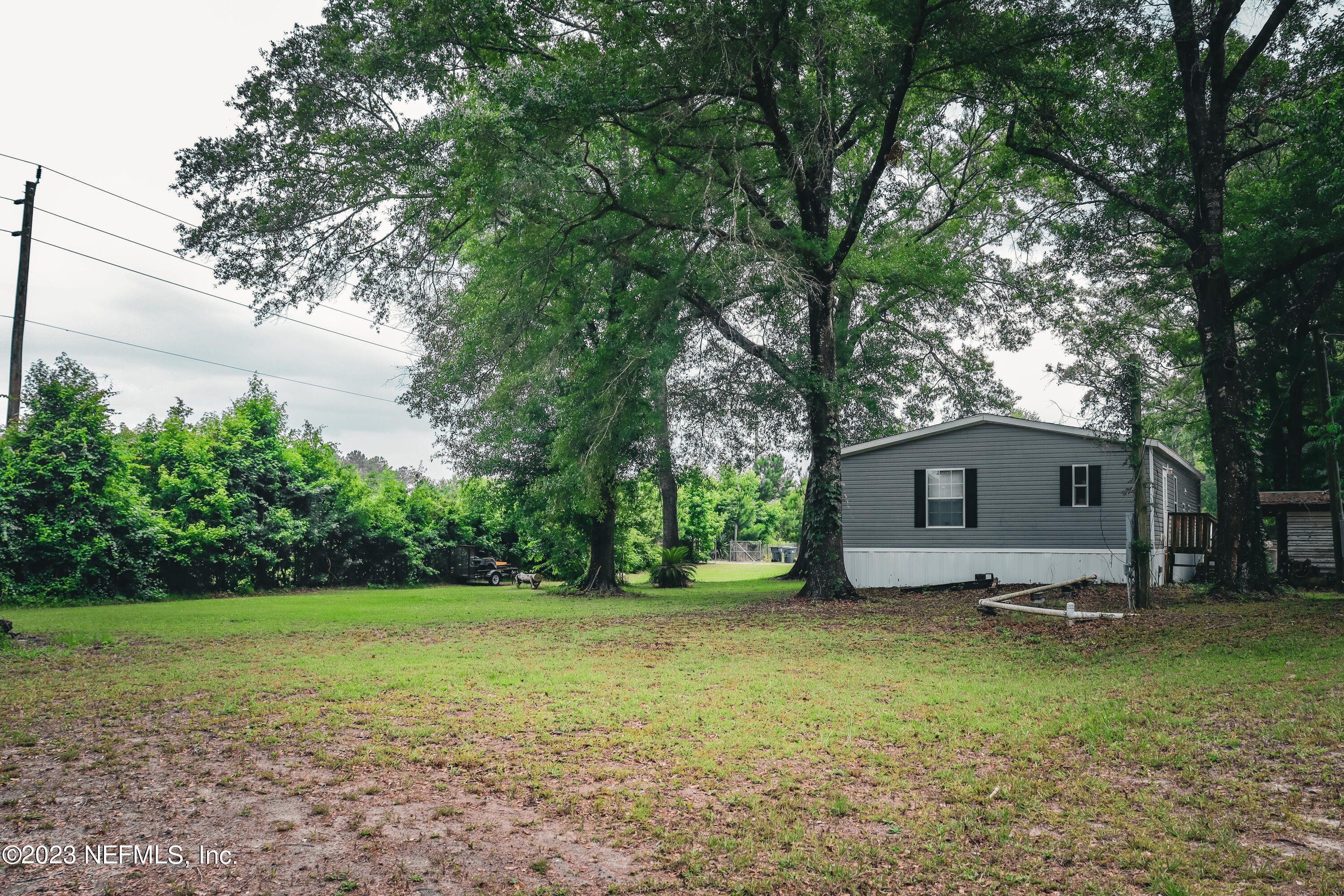 447689 Us Highway Callahan, FL 32011 - Photo 33 of 37 a view of a house with a yard