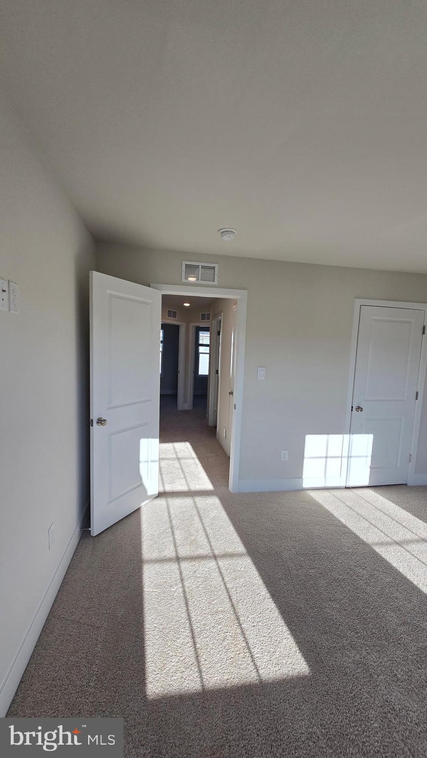 52 Aloma Street Ranson, WV 25438 - Photo 42 of 44 a view of a big room with closet and windows