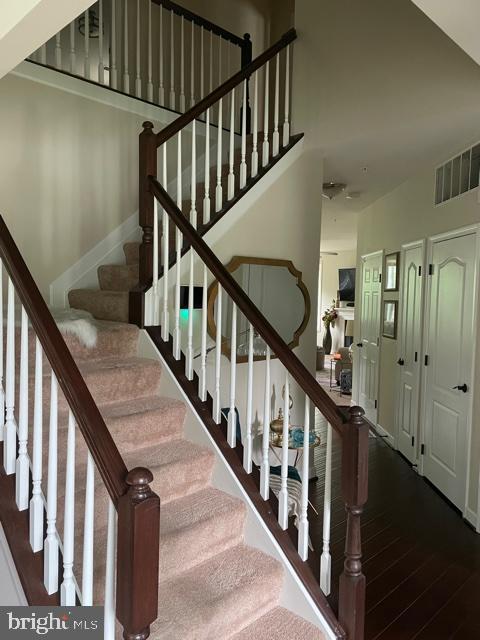 6705 Chapel Dale Road Bowie, MD 20720 - Photo 9 of 28 Staircase to upper level