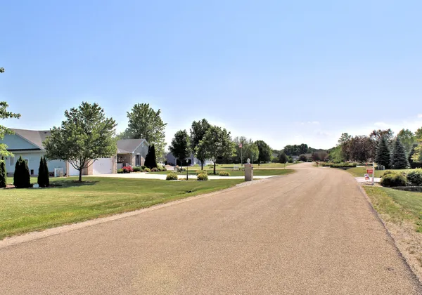 a view of a house with a big yard