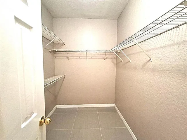 a view of a room with large windows