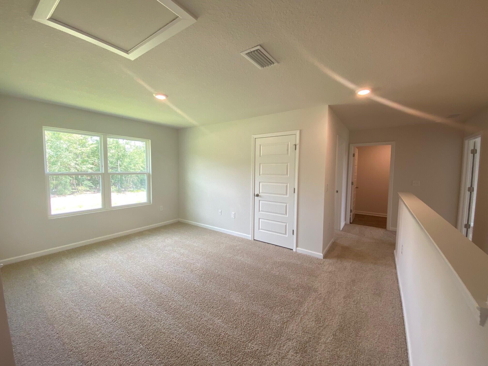 2861 Patriots Rdg Drive Crestview, FL 32539 - Photo 10 of 20 an empty room with windows and closet