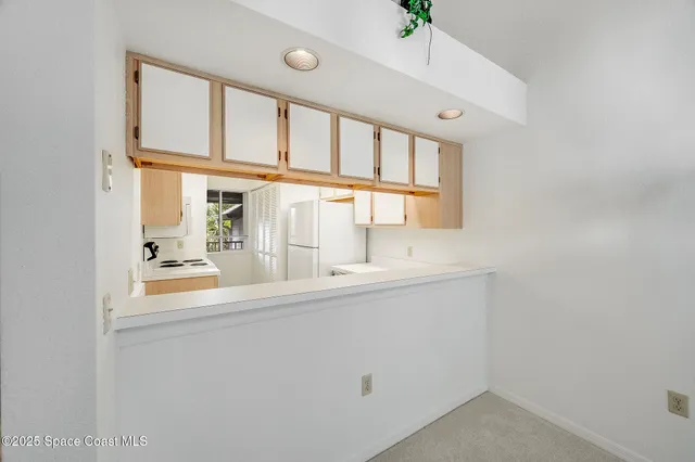 view of an empty room with a window