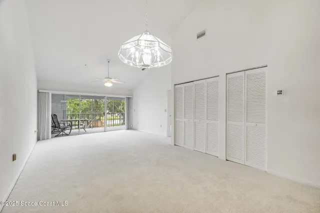 an empty room with a large window