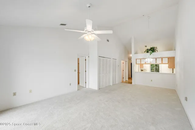 a view of a room with cabinet and entryway