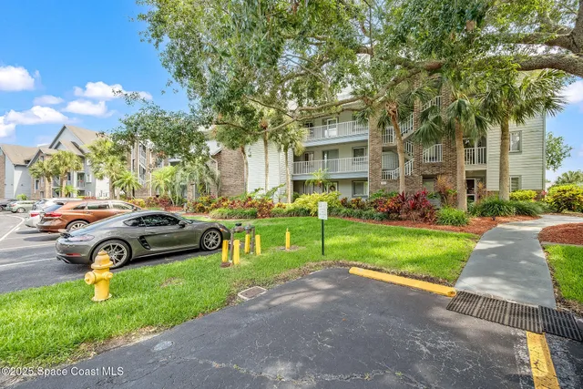 a view of street with parked cars