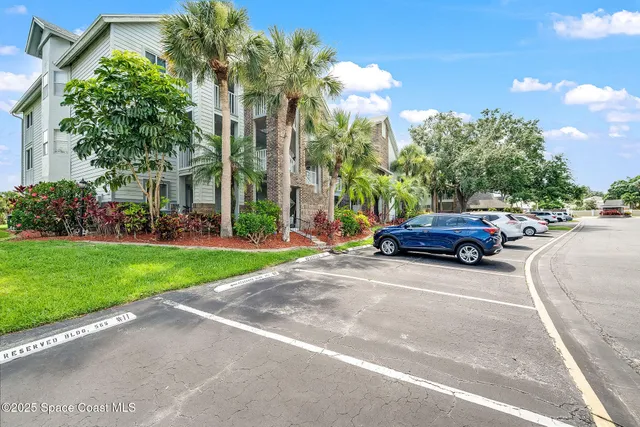 a view of street with parked cars