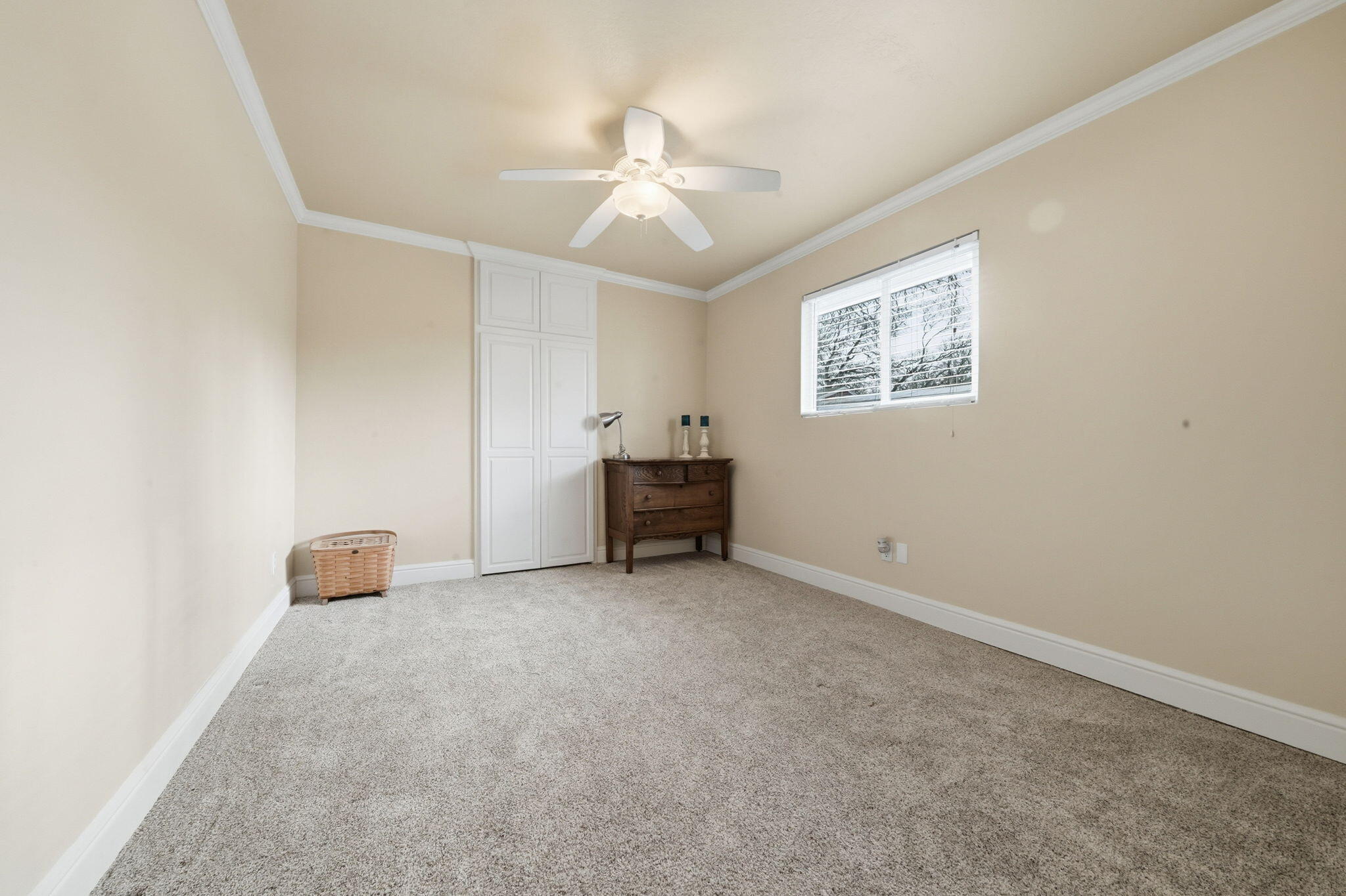 19690 Harp Road Cottonwood, CA 96022 - Photo 18 of 97 an empty room with a ceiling fan and window