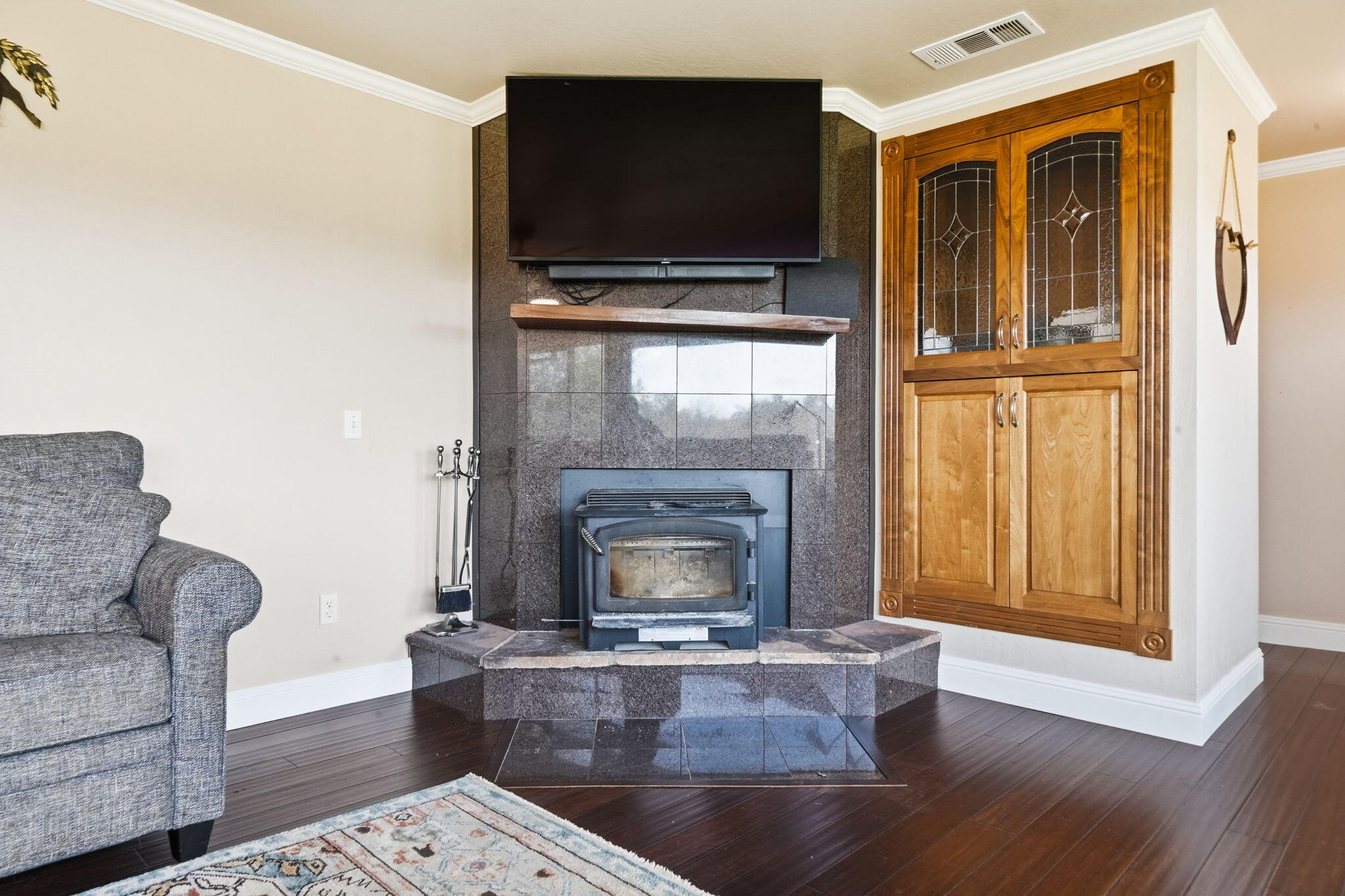 19690 Harp Road Cottonwood, CA 96022 - Photo 34 of 97 a living room with furniture and a fireplace