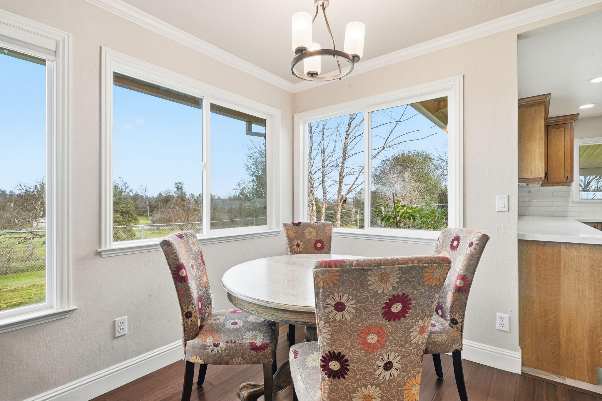 19690 Harp Road Cottonwood, CA 96022 - Photo 35 of 97 a view of a dining room with furniture window and wooden floor
