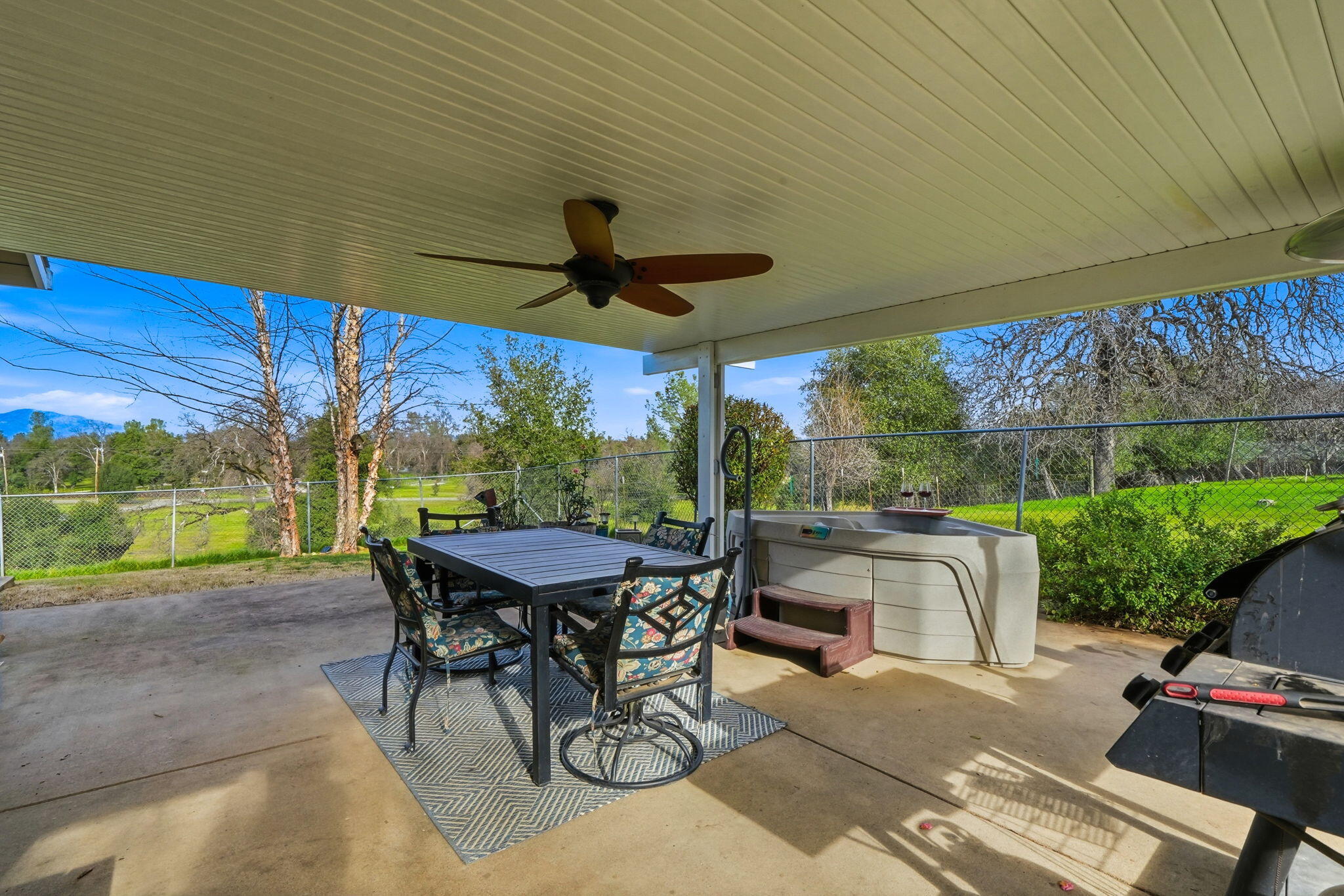 19690 Harp Road Cottonwood, CA 96022 - Photo 39 of 97 a view of a patio with a table chairs and a table