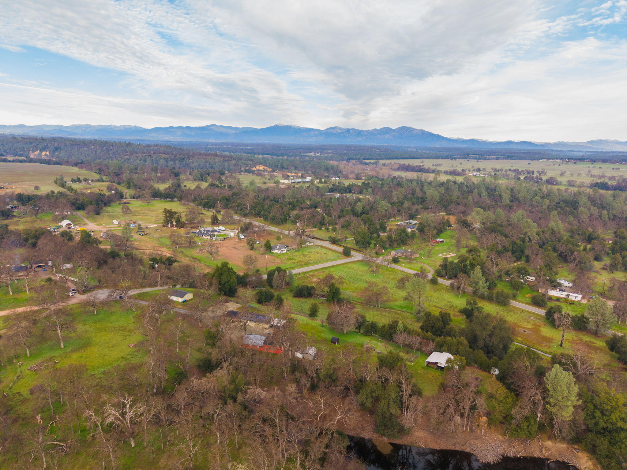 19690 Harp Road Cottonwood, CA 96022 - Photo 69 of 97 an aerial view of residential houses with outdoor space and trees