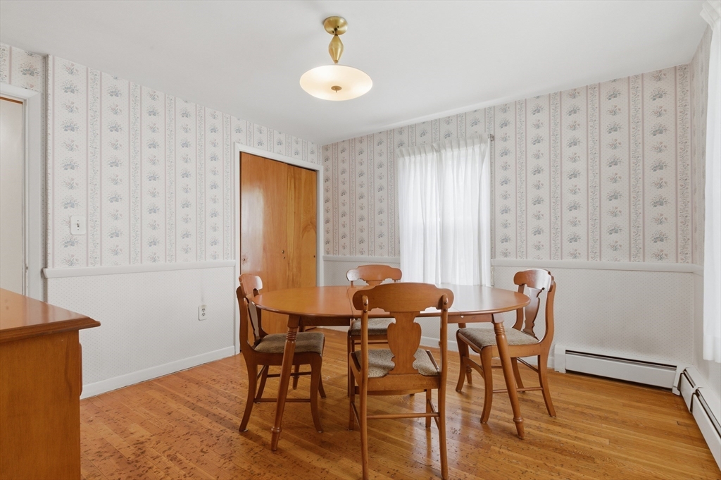 188 Glendale Road Attleboro, MA 02703 - Photo 5 of 37 a view of a dining room with furniture and wooden floor