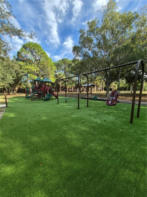 124 Hinchman Avenue Sebastian, FL 32958 - Photo 31 of 31 a view of a park with large trees