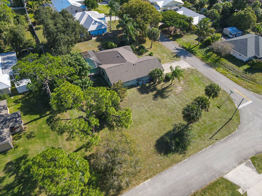 124 Hinchman Avenue Sebastian, FL 32958 - Photo 5 of 31 an aerial view of a house with a yard