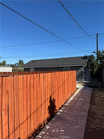 a view of a backyard of the house