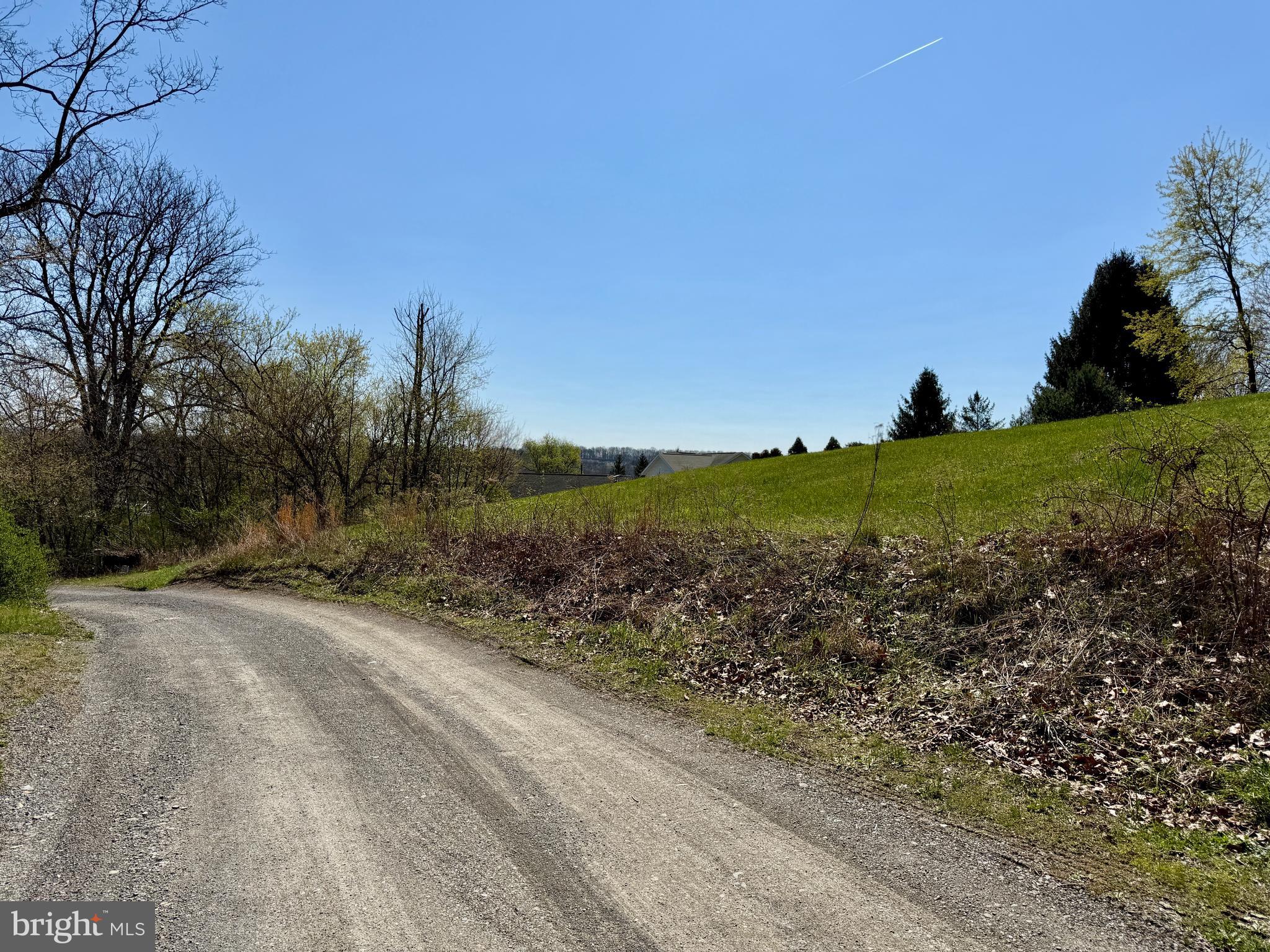 Lot 67 Ridgewood Drive New Paris, PA 15554 - Photo 9 of 9 a view of a road with a yard