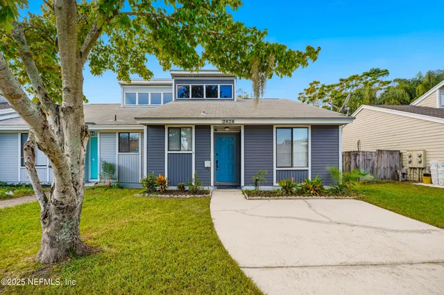 front view of a house with a yard