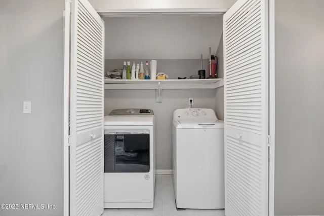 a utility room with dryer and washer