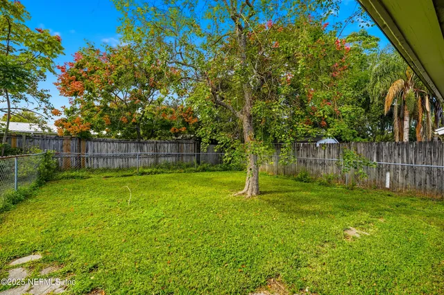 a view of an outdoor space and a yard