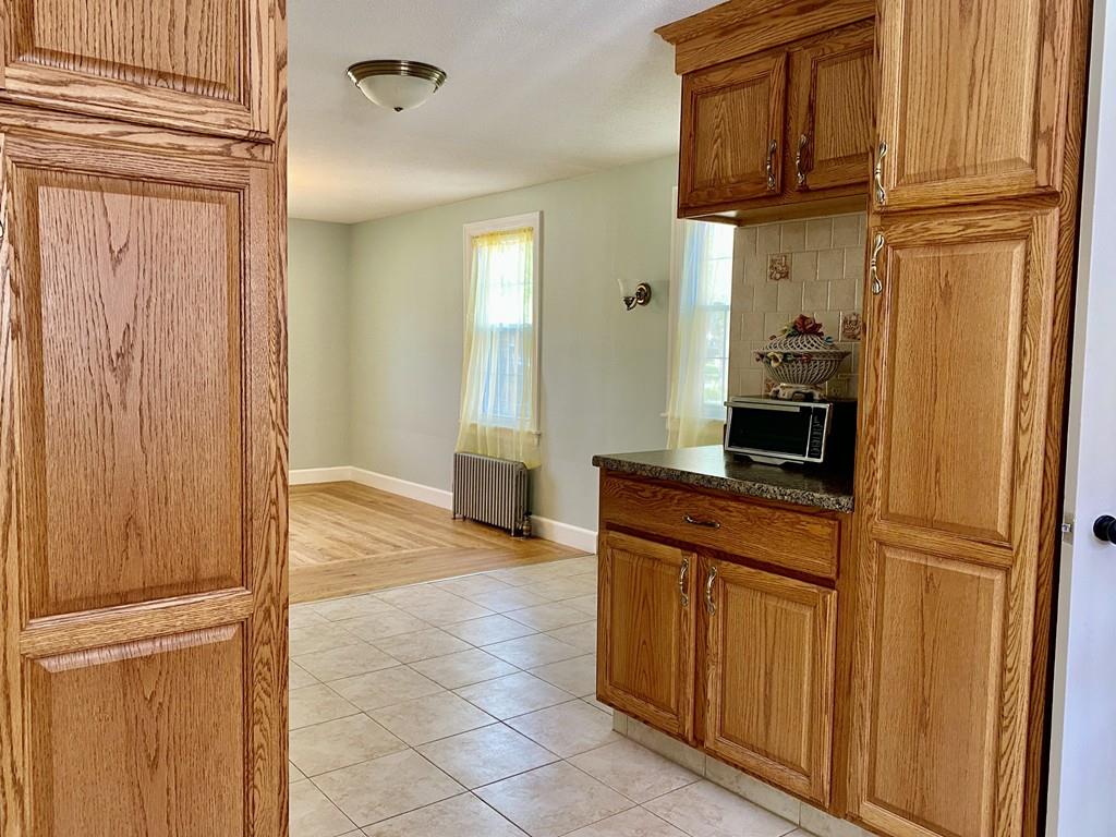 271 Gillette Avenue Springfield, MA 01118 - Photo 8 of 33 a view of a kitchen from the hallway