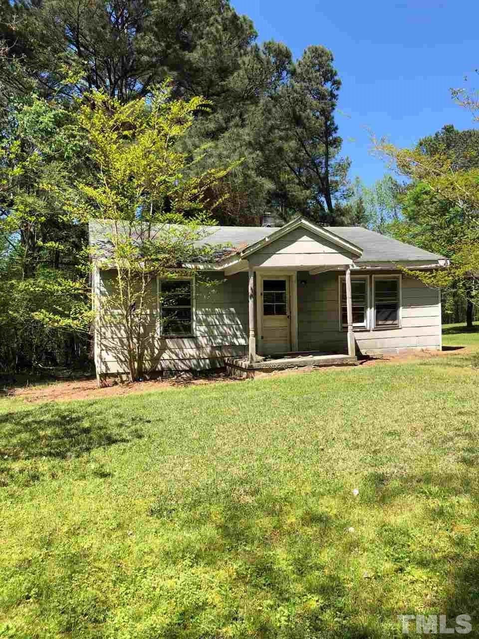 3138 Veridea Parkway Apex, NC 27539 - Photo 19 of 19 a front view of a house with a garden