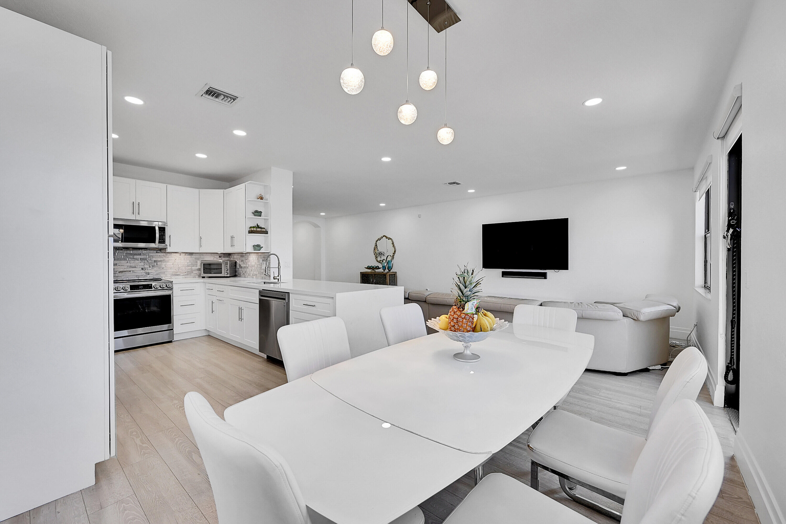 8459 Lakeview Trail Parkland, FL 33076 - Photo 15 of 55 a living room with furniture and a flat screen tv
