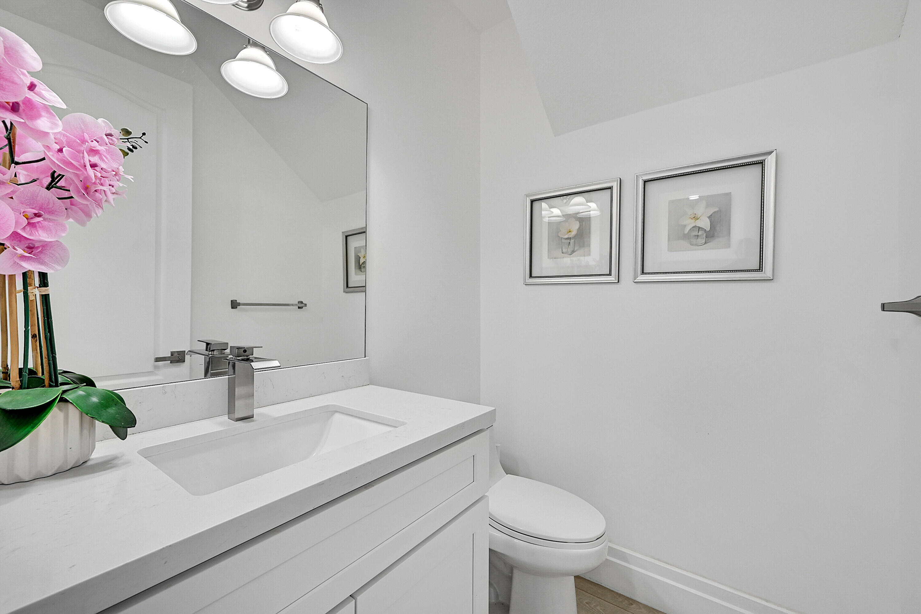 8459 Lakeview Trail Parkland, FL 33076 - Photo 20 of 55 a bathroom with a sink vanity mirror and toilet