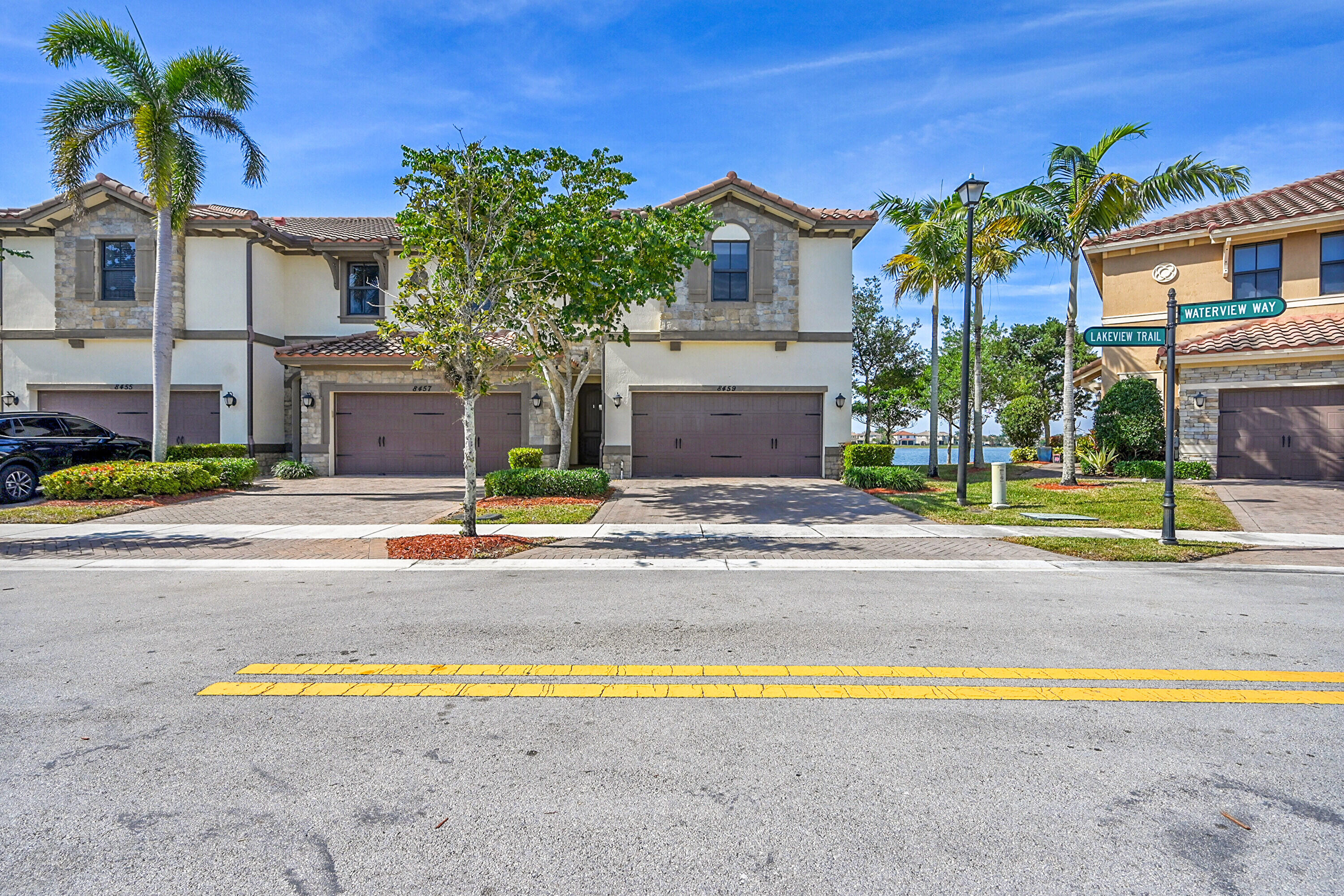 8459 Lakeview Trail Parkland, FL 33076 - Photo 2 of 55 a view of a house with a swimming pool