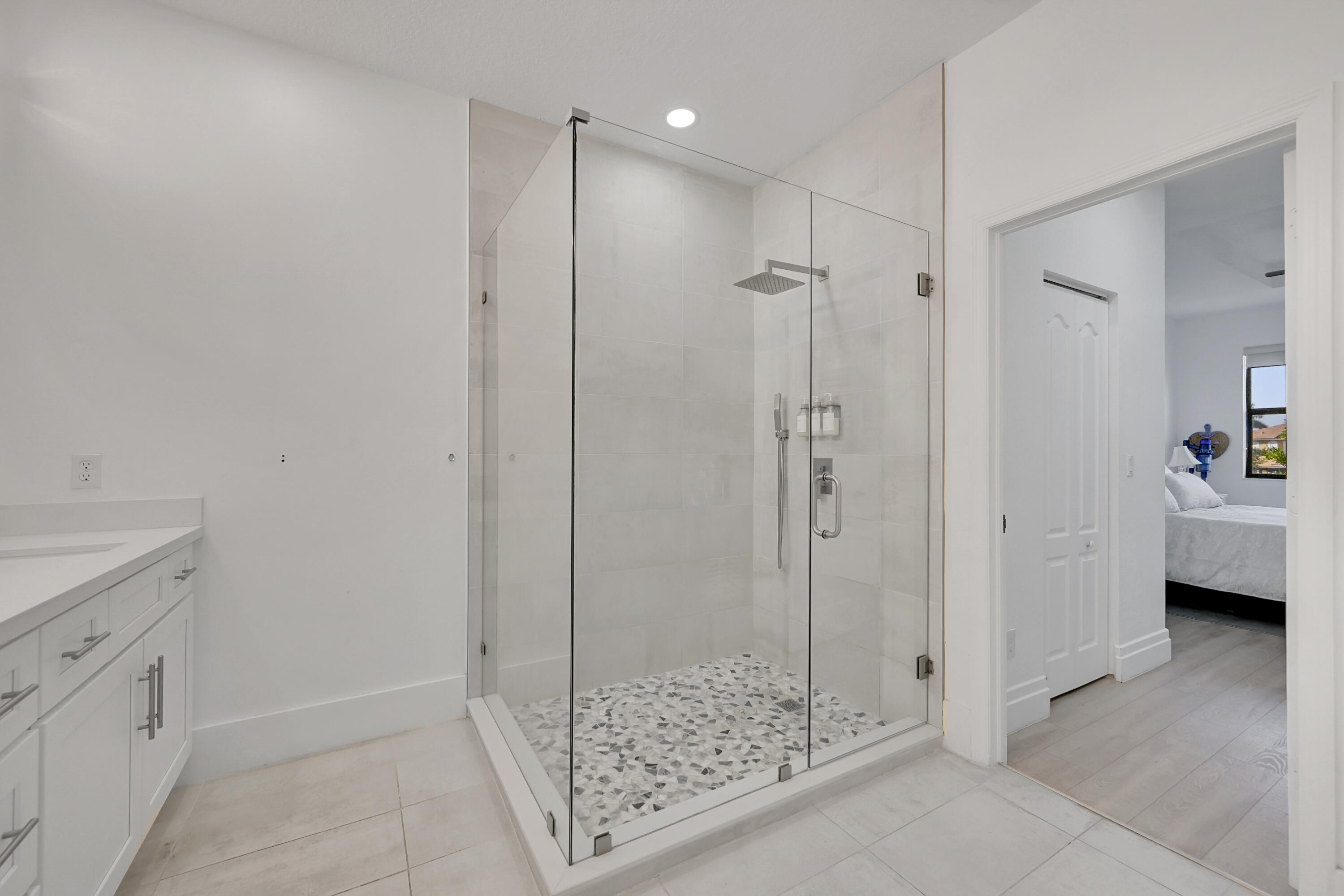 8459 Lakeview Trail Parkland, FL 33076 - Photo 26 of 55 a bathroom with a shower and a sink