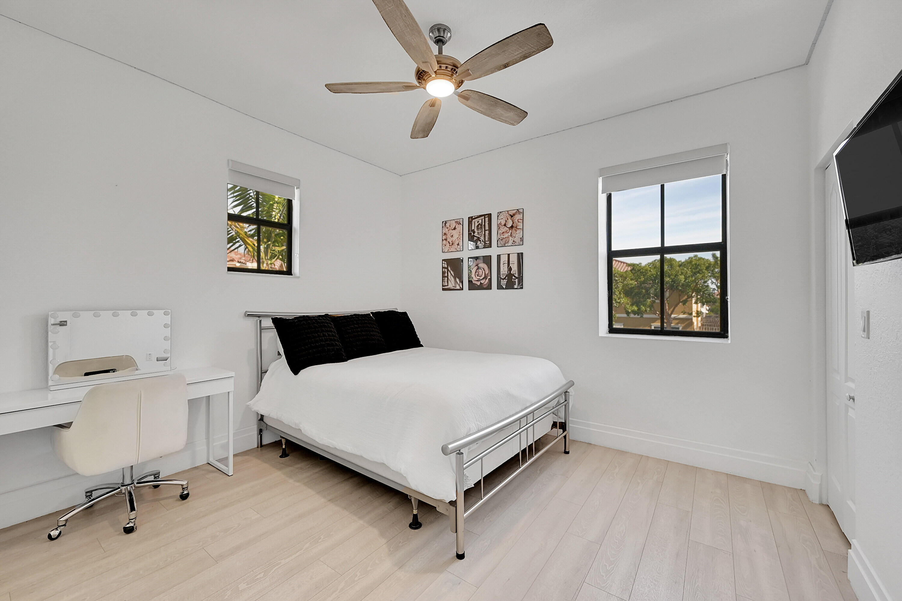 8459 Lakeview Trail Parkland, FL 33076 - Photo 27 of 55 a bedroom with a bed and a workspace