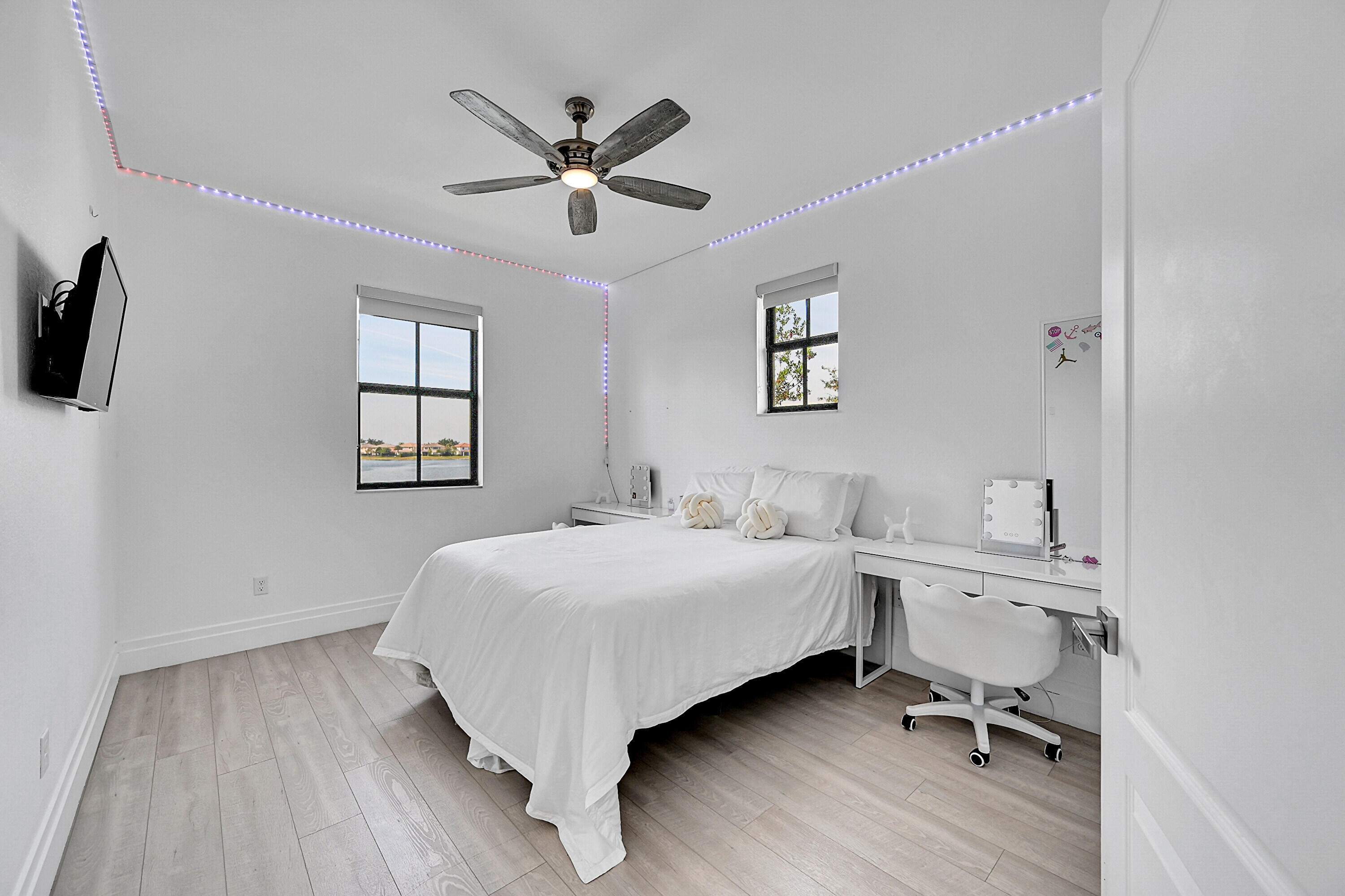 8459 Lakeview Trail Parkland, FL 33076 - Photo 34 of 55 a room with a bed and a window