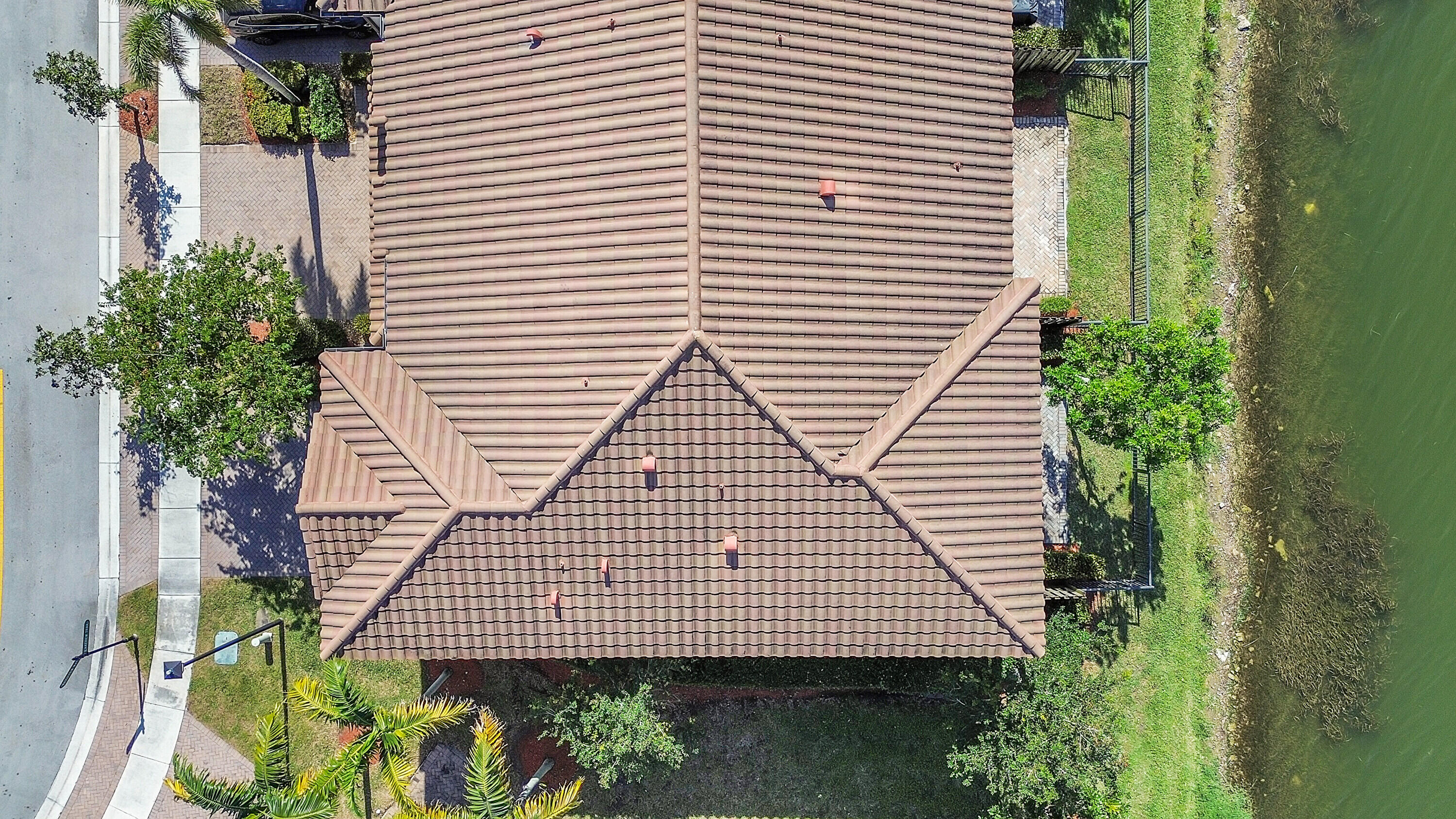 8459 Lakeview Trail Parkland, FL 33076 - Photo 45 of 55 a aerial view of a house with a yard and potted plants