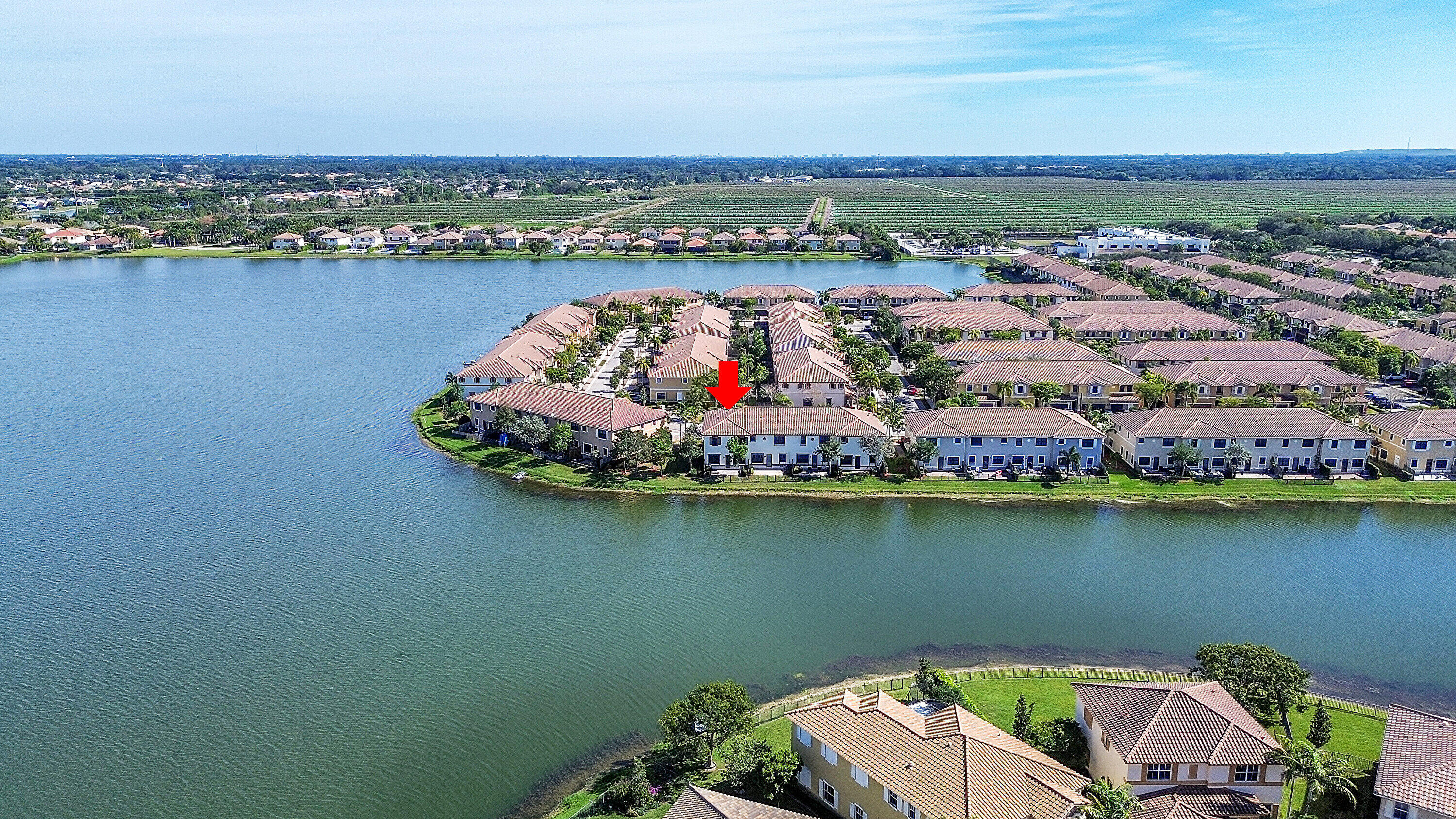 8459 Lakeview Trail Parkland, FL 33076 - Photo 52 of 55 an aerial view of a house with a lake view