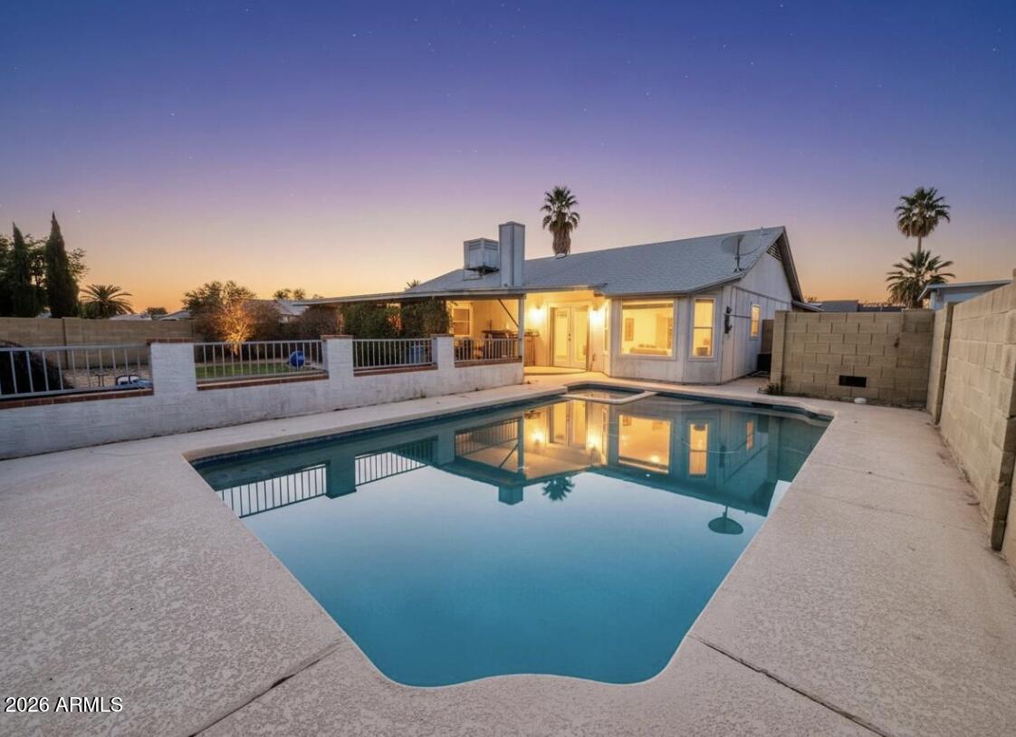 3425 East Libby Street Phoenix, AZ 85032 - Photo 2 of 16 a view of a swimming pool