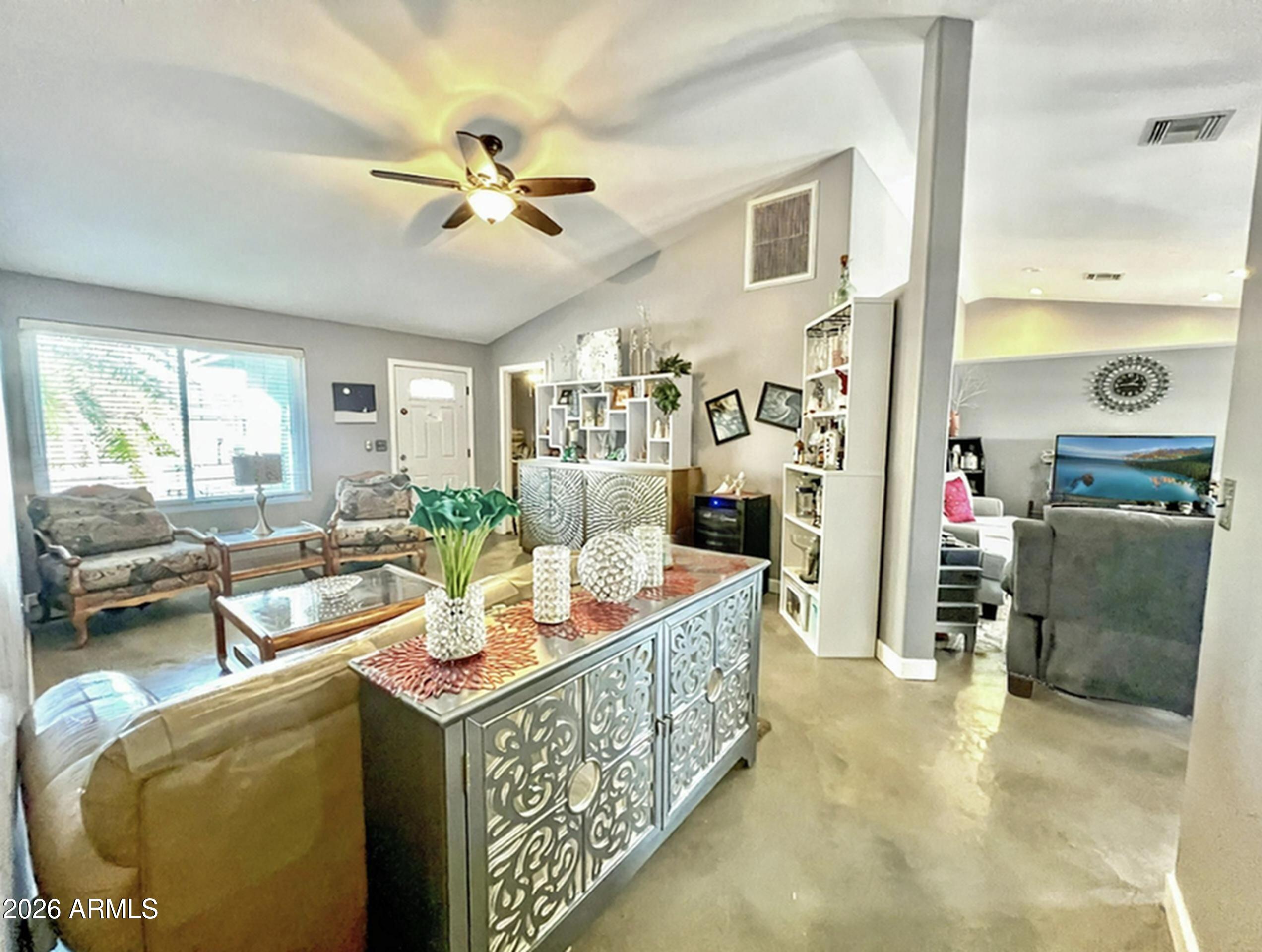 3425 East Libby Street Phoenix, AZ 85032 - Photo 3 of 16 a living room with furniture and a large window